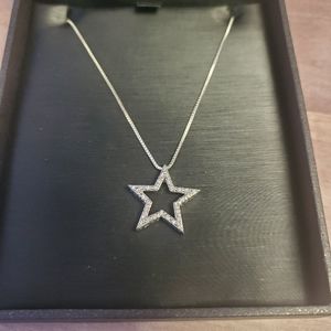 Diamond star pendant with sterling silver chain